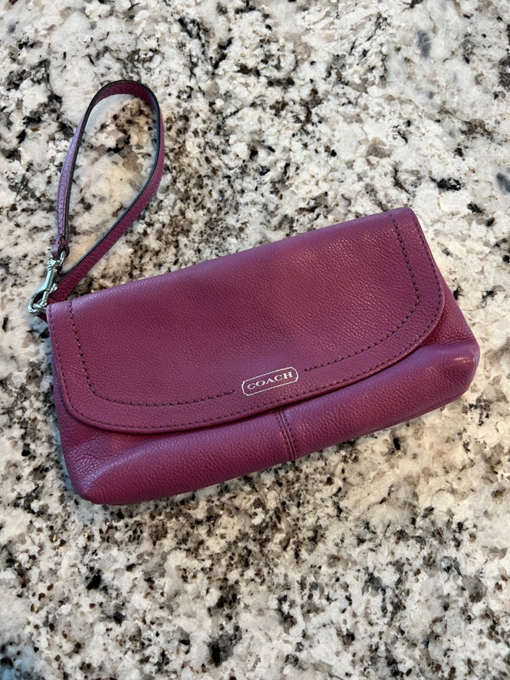 Coach Pebbled Leather Wristlet in Plum